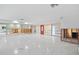 Open basement area undergoing renovation, featuring tiled floors at 410 55Th Ave, St Pete Beach, FL 33706