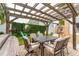 Cozy patio area under a wooden pergola at 4206 W Empedrado St, Tampa, FL 33629