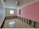 Pink bedroom under renovation at 4299 Columbus Dr, Hernando Beach, FL 34607