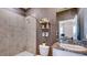 Single vanity bathroom with shower and granite countertop at 4318 Pullet Ct, Lakewood Ranch, FL 34211