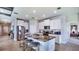 Modern kitchen with stainless steel appliances and granite island at 4318 Pullet Ct, Lakewood Ranch, FL 34211