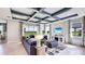 Open living area with high ceilings and large windows at 4318 Pullet Ct, Lakewood Ranch, FL 34211