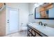 Bathroom with single vanity and frosted glass door at 4919 Turtle Creek Trl, Oldsmar, FL 34677