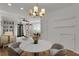 Dining area with marble table and built-in shelving at 506 S Willow Ave # 11, Tampa, FL 33606