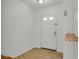 Bright entryway with tile floors and wood shelf at 506 S Willow Ave # 11, Tampa, FL 33606