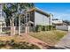 Gray two-story home with brick walkway and gate at 506 S Willow Ave # 11, Tampa, FL 33606