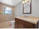 Bathroom with a walk-in shower and modern vanity at 5500 Denver Ne St, St Petersburg, FL 33703