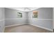Bright bedroom with light gray walls and wood flooring at 5500 Denver Ne St, St Petersburg, FL 33703