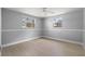 Bright bedroom with light gray walls and wood flooring at 5500 Denver Ne St, St Petersburg, FL 33703