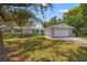 Ranch style home features a large front yard and mature landscaping at 5500 Denver Ne St, St Petersburg, FL 33703