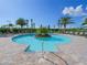 Resort-style pool with lounge chairs and umbrellas at 5531 Orsello St, Palmetto, FL 34221