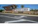 Artisan Lakes entrance sign with stone and wood accents at 5531 Orsello St, Palmetto, FL 34221