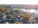 Aerial view of house near the lake, showcasing its setting and surroundings at 6709 Ranger Dr, Tampa, FL 33615
