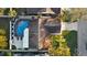 House with a pool and a well-maintained yard at 6709 Ranger Dr, Tampa, FL 33615