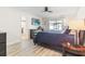 Bright bedroom with king-size bed and en-suite bathroom at 6709 Ranger Dr, Tampa, FL 33615