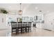 Updated kitchen with white cabinets, stainless steel appliances and breakfast nook at 6709 Ranger Dr, Tampa, FL 33615