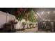 Landscaped pathway with flowering trees and pathway lighting at 6709 Ranger Dr, Tampa, FL 33615