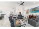 Spacious living room featuring leather furniture and a fireplace at 6709 Ranger Dr, Tampa, FL 33615