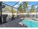 Relaxing pool area with lounge chairs and a patio at 6709 Ranger Dr, Tampa, FL 33615