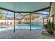 Screened pool and patio area with plenty of seating at 6709 Ranger Dr, Tampa, FL 33615