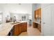 Kitchen with breakfast bar and view to living area at 7001 Interbay Blvd # 313, Tampa, FL 33616