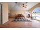 Large bedroom with high ceiling, lots of natural light, and wood flooring at 10126 Londonshire Ln, Tampa, FL 33647