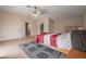 Bright bedroom with large window and wood flooring at 10126 Londonshire Ln, Tampa, FL 33647