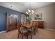 Formal dining room with wooden table and chairs at 10126 Londonshire Ln, Tampa, FL 33647