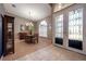 Elegant entryway with a dining room and stained glass doors at 10126 Londonshire Ln, Tampa, FL 33647