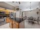 Kitchen features granite island and breakfast nook at 10126 Londonshire Ln, Tampa, FL 33647