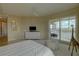 Bright bedroom with water views and access to balcony at 10520 Boardwalk Loop # 503, Bradenton, FL 34202