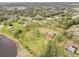Aerial view of home, lot, and pond at 10813 Dixon Dr, Riverview, FL 33579