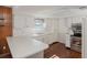 Bright kitchen with white cabinets, stainless steel appliances, and tile flooring at 10813 Dixon Dr, Riverview, FL 33579