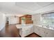 Kitchen with white cabinets, tile floors, and a breakfast bar at 10813 Dixon Dr, Riverview, FL 33579