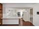 Kitchen features white cabinets, tile floors and stainless steel appliances at 10813 Dixon Dr, Riverview, FL 33579