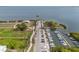 Aerial view of a full-service marina with many boats and parking at 111 Wateredge Ct, Safety Harbor, FL 34695