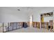 Unfinished bedroom with exposed framing at 11435 2Nd E St, Treasure Island, FL 33706