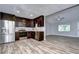 Updated kitchen, stainless steel appliances, dark cabinets at 11505 Blackbark Dr, Riverview, FL 33579