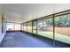Long screened-in porch with backyard view at 11505 Blackbark Dr, Riverview, FL 33579