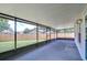 Spacious covered screened porch at 11505 Blackbark Dr, Riverview, FL 33579