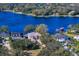 Bird's-eye view of the house and surrounding lakefront community at 11710 N Armenia Ave, Tampa, FL 33612