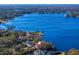 Property location shown from above, situated on a lakefront lot at 11710 N Armenia Ave, Tampa, FL 33612