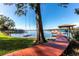Lake access with a dock, providing a relaxing waterfront view at 11710 N Armenia Ave, Tampa, FL 33612
