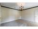 Large bedroom with neutral colored walls and carpet at 11710 N Armenia Ave, Tampa, FL 33612