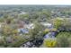 High-angle view of houses near a waterway, showing lush vegetation at 1214 E Park Cir, Tampa, FL 33604