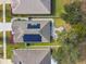Aerial view of home with solar panels and patio at 12645 Flatwood Creek Dr, Gibsonton, FL 33534