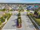 Gated community entrance with ornate iron gates at 12645 Flatwood Creek Dr, Gibsonton, FL 33534