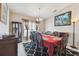 Formal dining room with wood table and chairs at 12645 Flatwood Creek Dr, Gibsonton, FL 33534