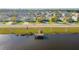 Community fishing dock by the lake at 12645 Flatwood Creek Dr, Gibsonton, FL 33534