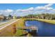 Wooden dock offering serene lake access at 12645 Flatwood Creek Dr, Gibsonton, FL 33534